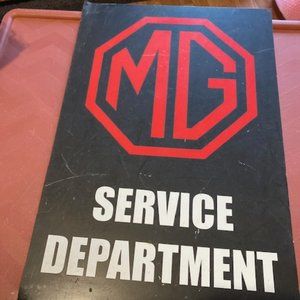 MG metal service department sign